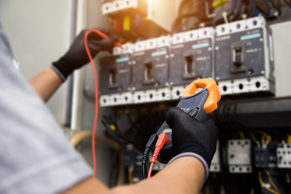 Electrician,Use,Electrical,Measuring,Tool,Meter,At,Main,Panel,Circuit