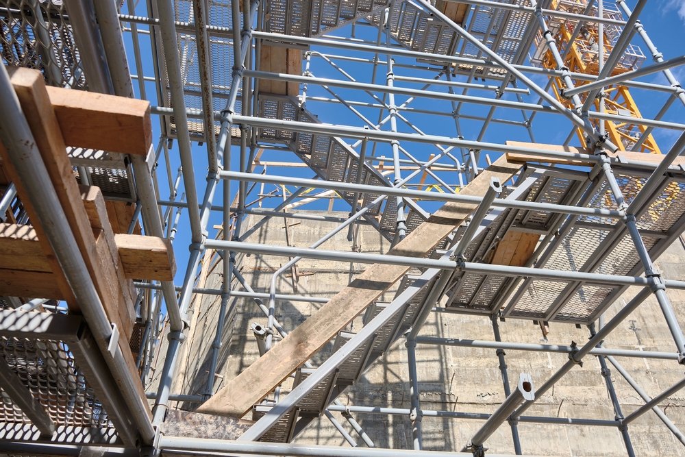 Low,Angle,View,Of,Industrial,Stair,Tower,And,Scaffoldings,At